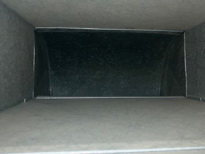 Inside ductwork after being cleaned. Clear of any dust or debris, just clean metal.