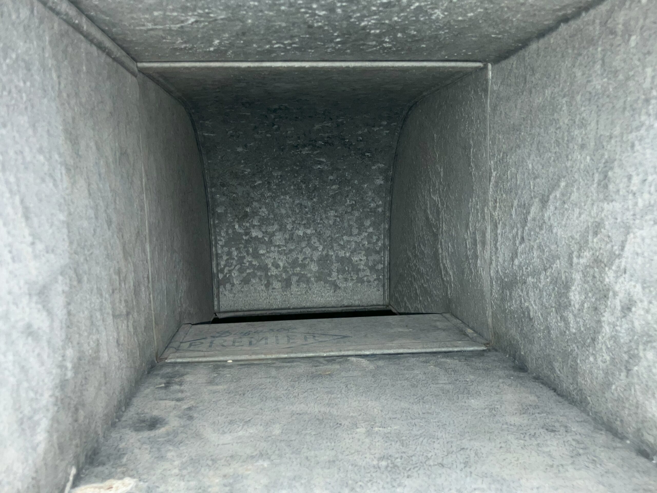 Inside metal ductwork after being cleaned. Free of dust and debris.